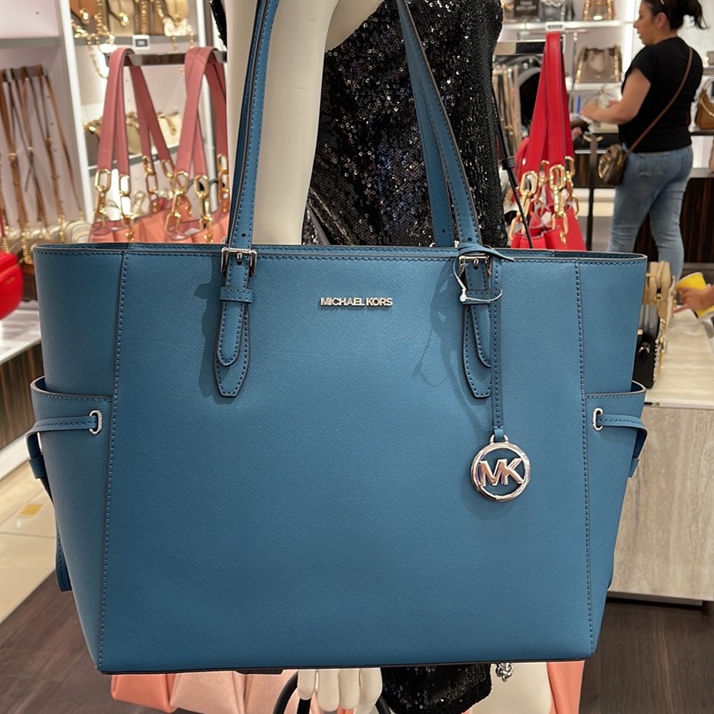 Michael Kors Gilly Large Drawstring Travel Leather Top Zip Tote
 Color: TEAL
NWT - Picture 6 of 16